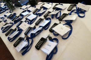 IML Clickers are attached to attendee nametags with Ovation lanyards to assist in creating a customized experience.