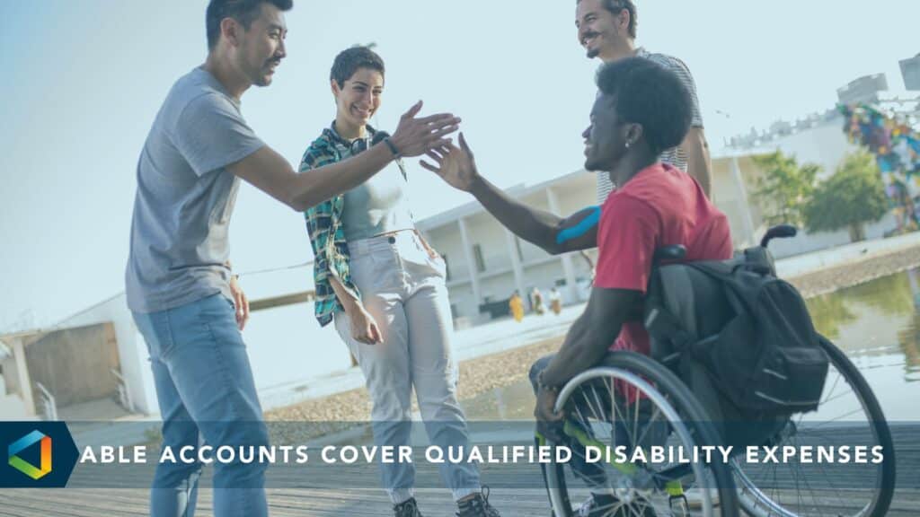 group of people greeting man in wheelchair with the caption that reads: ABLE accounts cover qualified disability expenses
